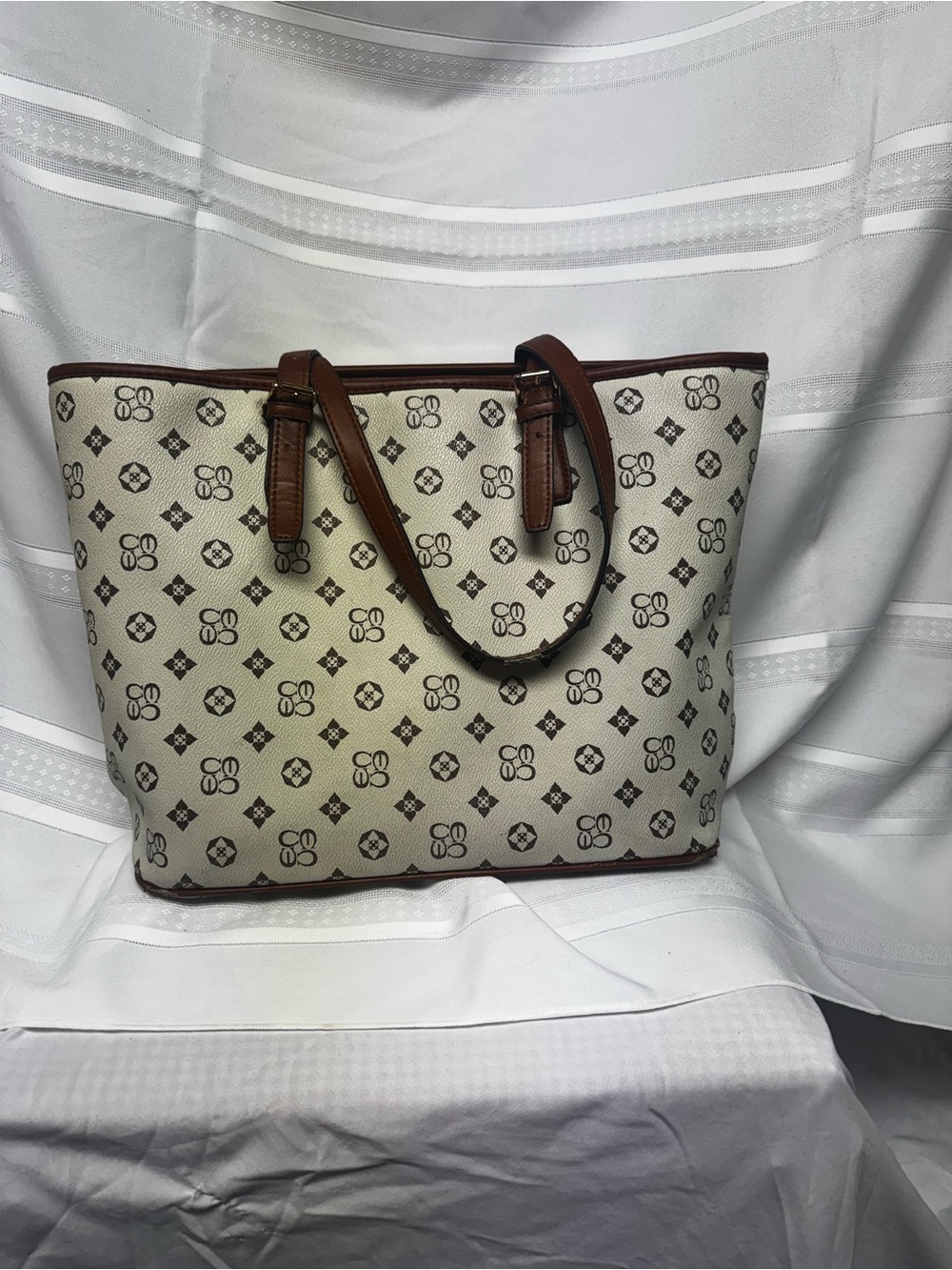 Cream Patterned Tote with Brown Trim and Leather Handles